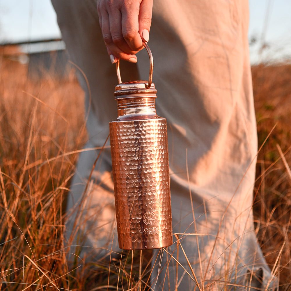 Coppa Hammered Copper Water Bottle 750ml lifestyle