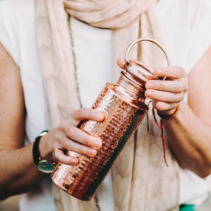 
                  
                    Coppa Hammered Copper Water Bottle lifestyle
                  
                